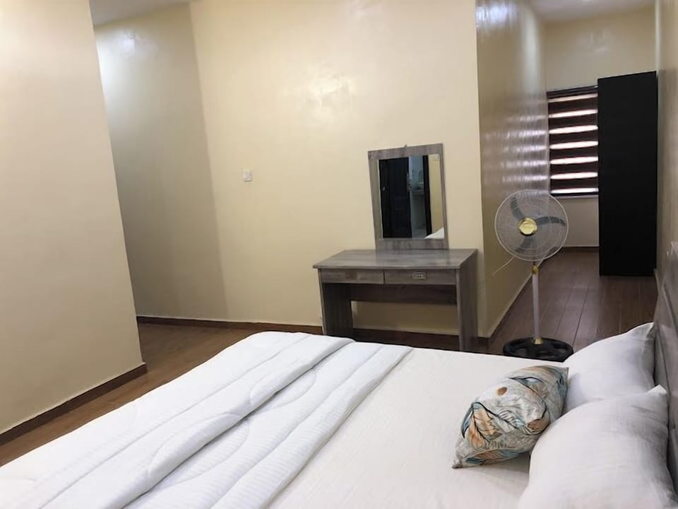 Family Room, Balcony, City View | Desk, laptop workspace, free WiFi