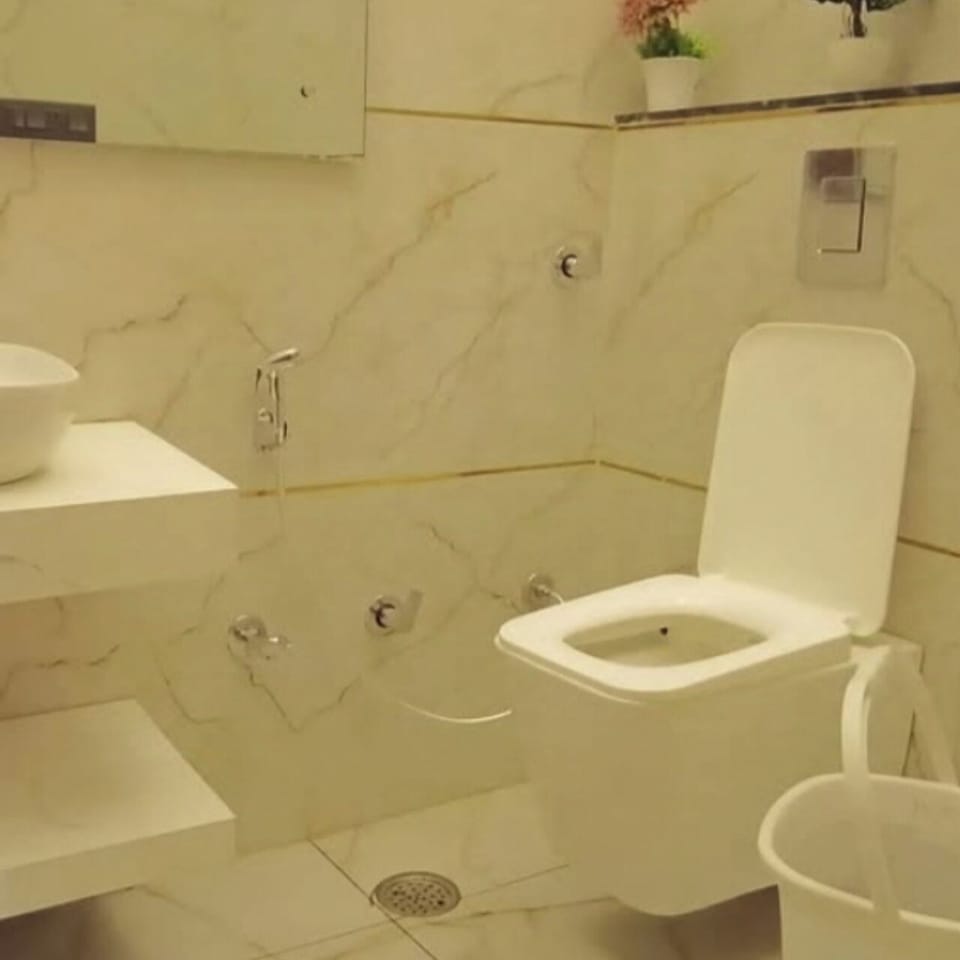 Standard Double Room, Balcony, City View | Bathroom | Shower, slippers, towels, soap