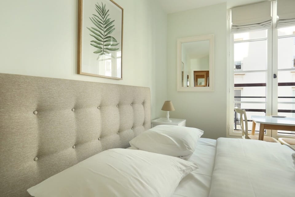Apartment | Laptop workspace, iron/ironing board, bed sheets