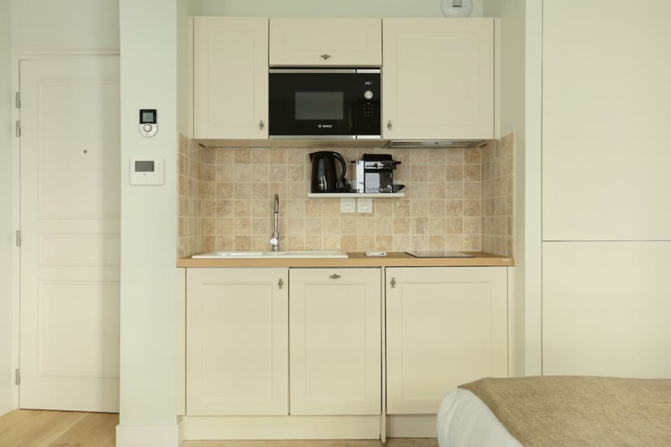 Apartment | Private kitchen | Coffee/tea maker, fridge, microwave, stovetop