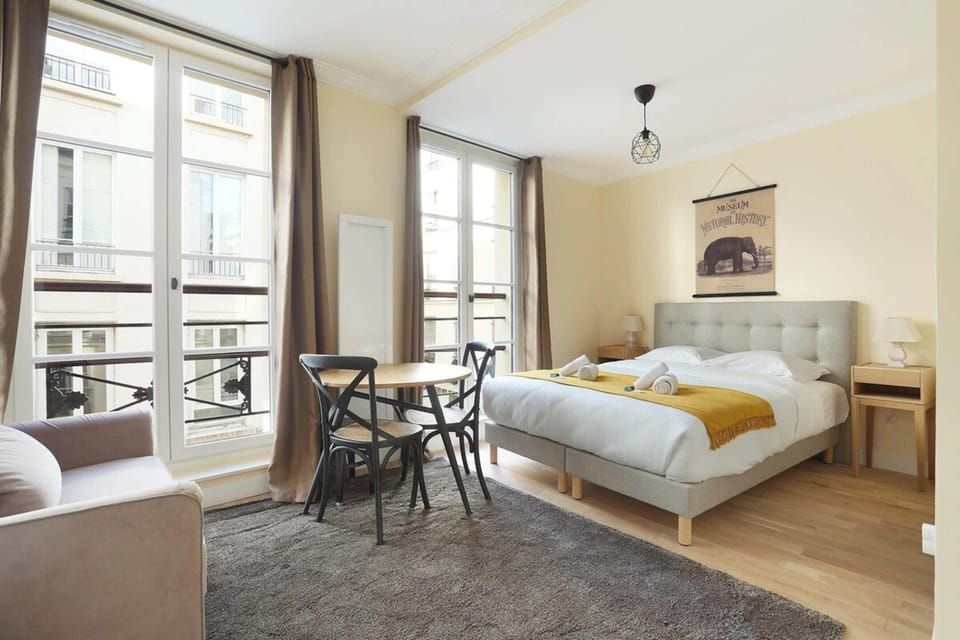Apartment | Laptop workspace, iron/ironing board, bed sheets