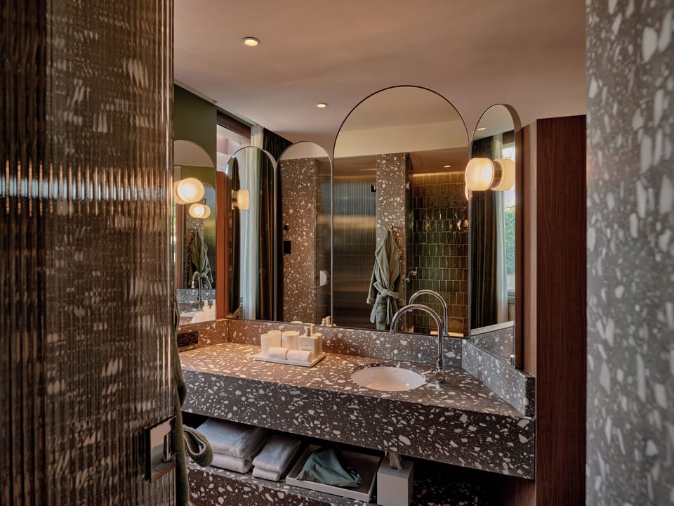Sunset Suite | Bathroom | Designer toiletries, hair dryer, bathrobes, slippers