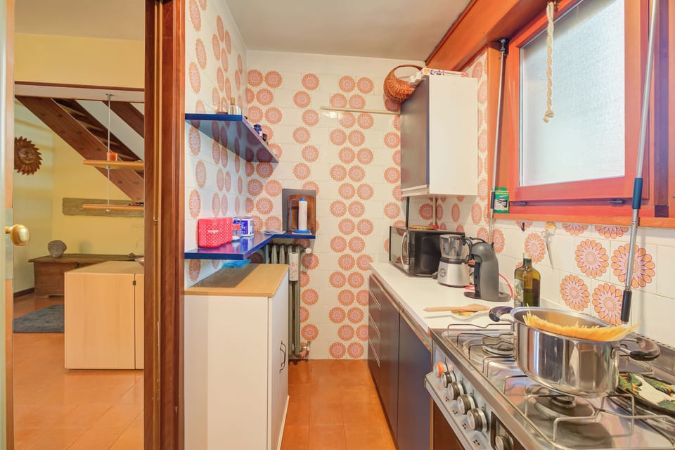 Standard Apartment, Multiple Bedrooms (Lo Stambecco) | Private kitchen | Fridge, oven, stovetop, coffee/tea maker