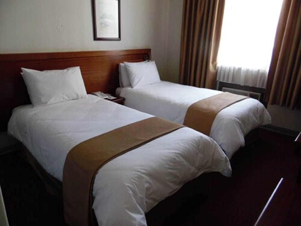 Standard Twin Room, 2 Twin Beds | In-room safe, desk, laptop workspace, free WiFi