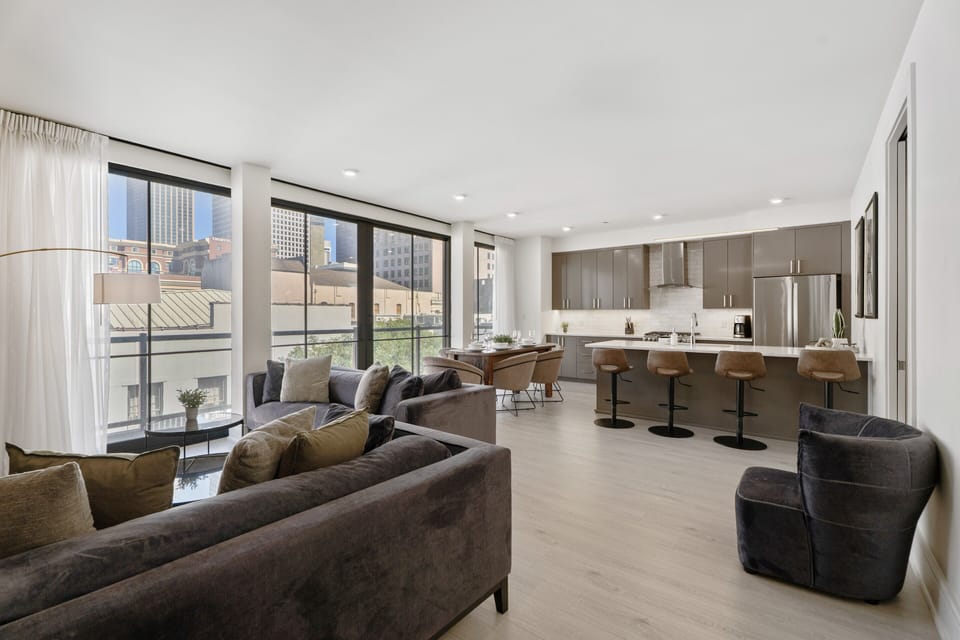 Family Apartment, 3 Bedrooms, Balcony | Living area | 55-inch Smart TV with digital channels