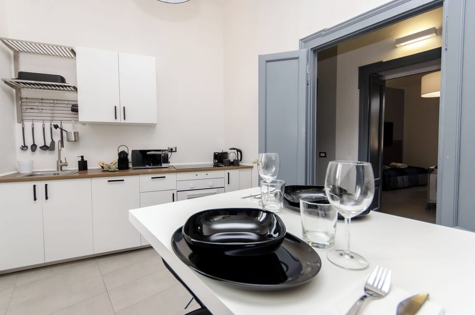 Basic Apartment | Private kitchen | Full-size fridge, microwave, oven, stovetop