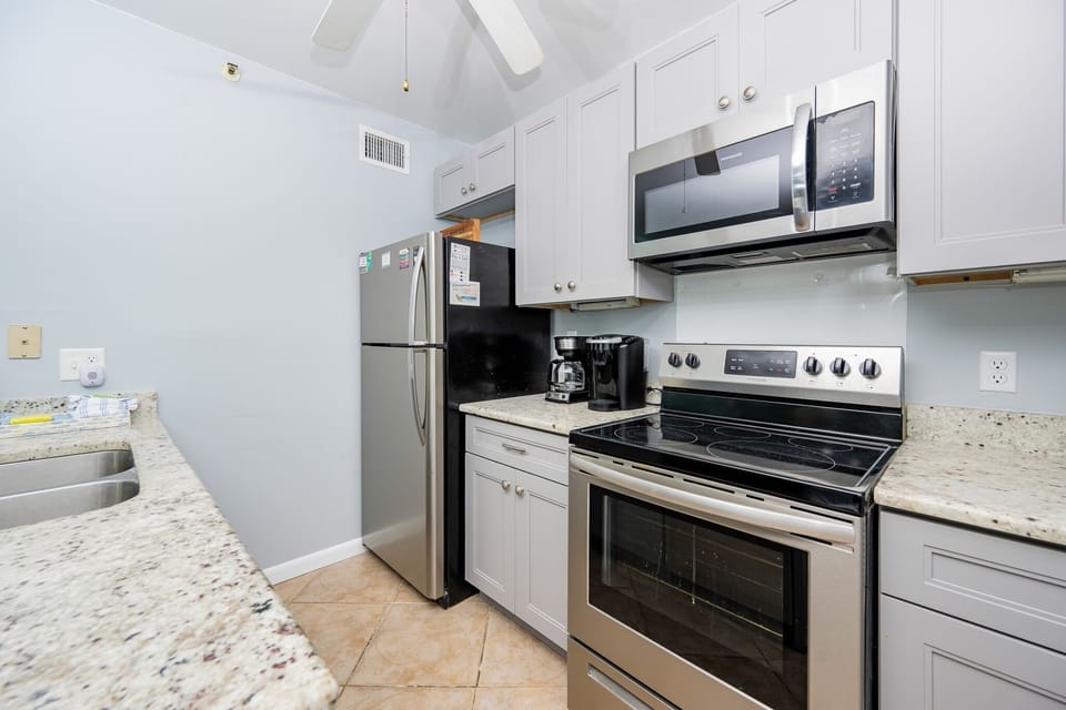 Condo, 2 Bedrooms | Private kitchen | Coffee/tea maker, fridge