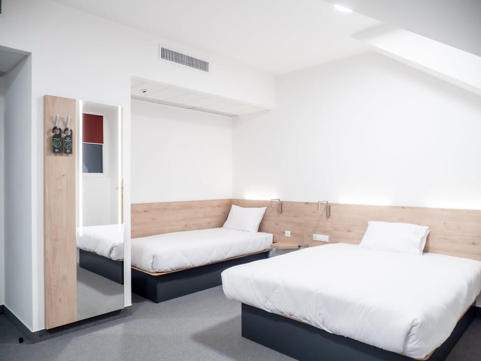 Family Triple Room, 1 Bedroom | Desk, laptop workspace, soundproofing, WiFi (free)