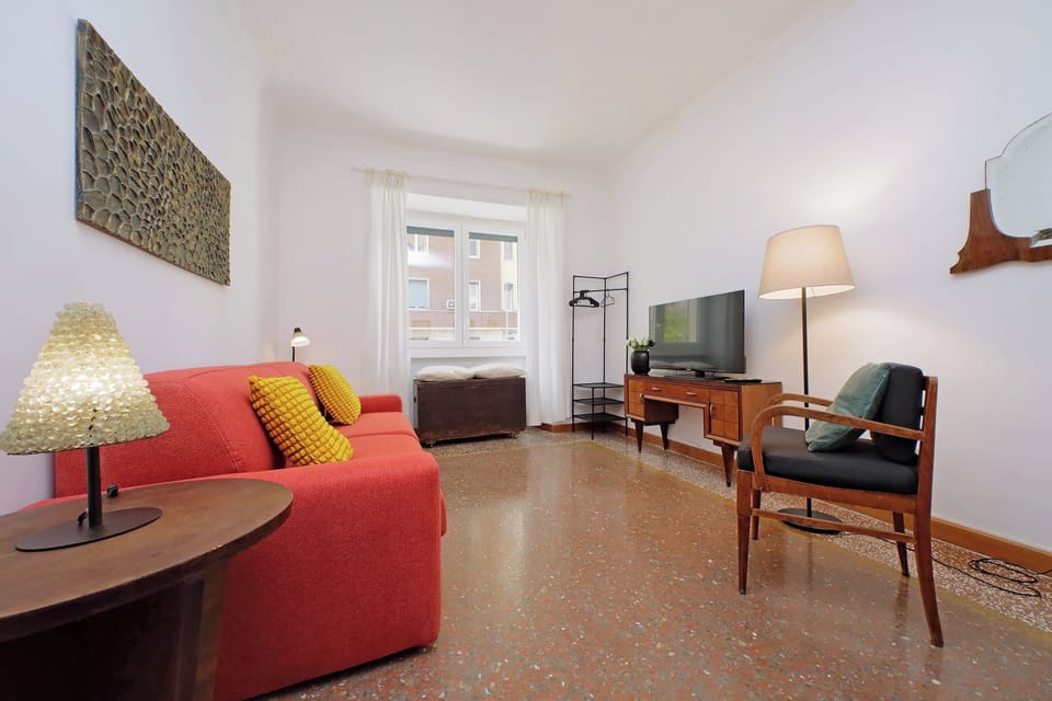 Apartment | Living area | 32-inch flat-screen TV with cable channels
