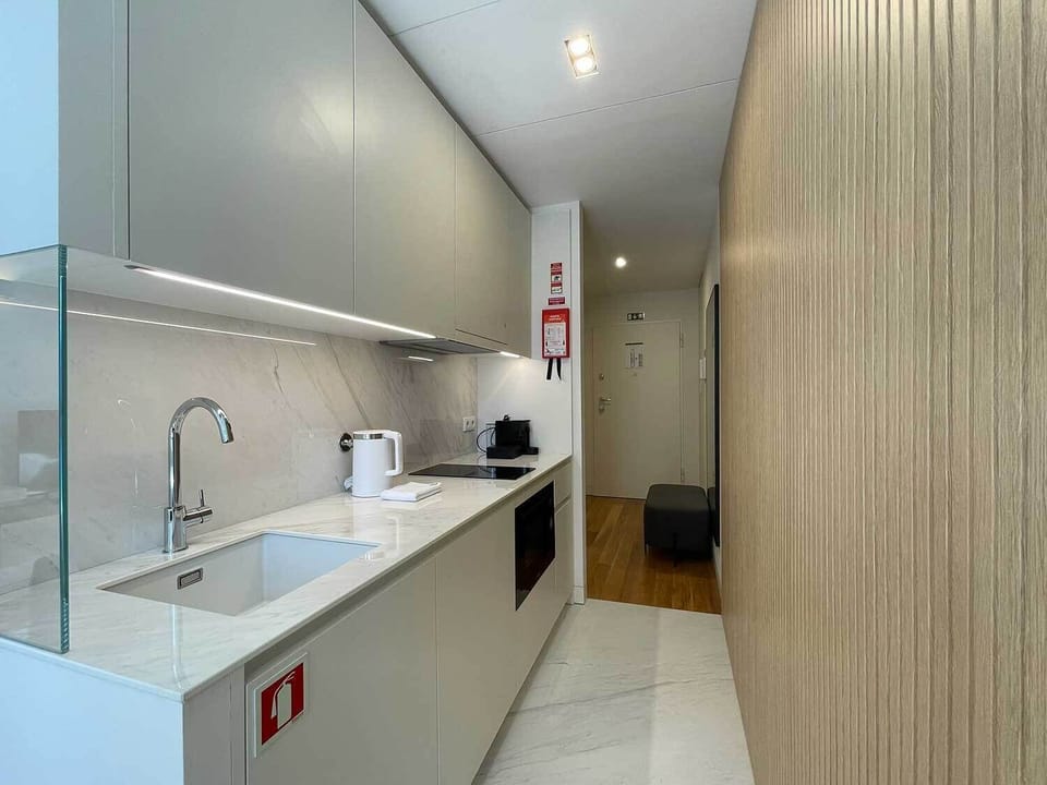 Executive Condo, 2 Twin Beds, City View | Private kitchen | Fridge, microwave, stovetop, espresso maker