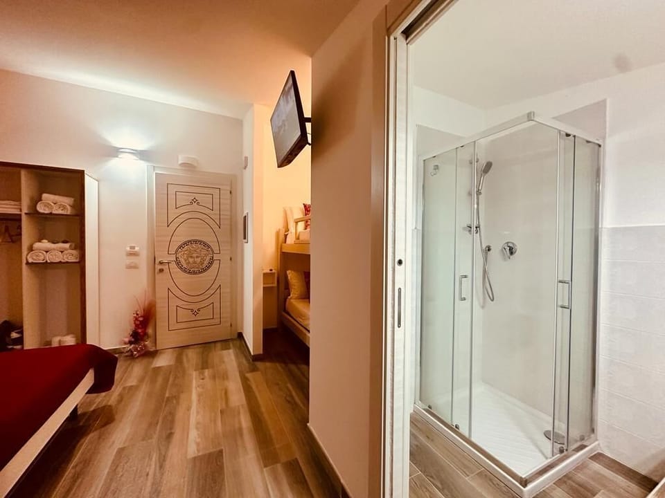 Shower, free toiletries, hair dryer, slippers