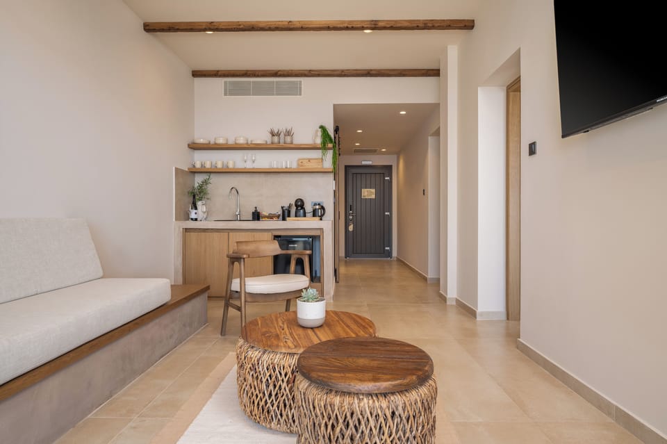 Superior Studio Suite, 2 Bedrooms | Living area | TV