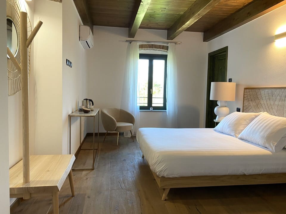 Deluxe Double Room, Private Bathroom, Hill View | Individually decorated, individually furnished, desk, laptop workspace