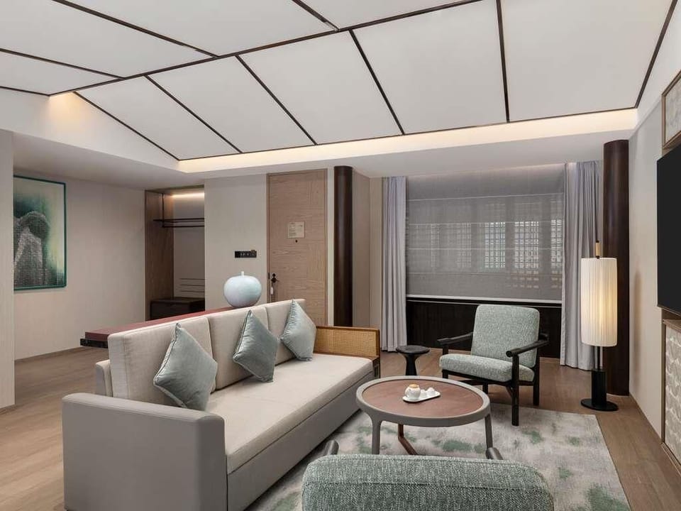 Deluxe Suite, 1 King Bed with Sofa bed (Sky Pavilion) | Minibar, in-room safe, blackout drapes, iron/ironing board