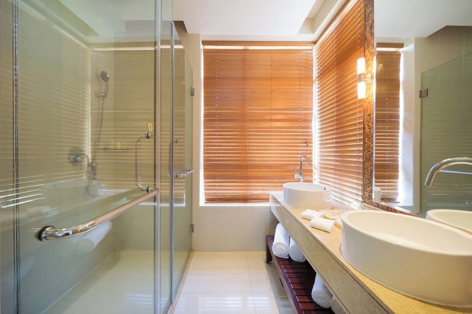 Exclusive Suite, Mountain View (1 King Bed and 1 Twin Bed) | Bathroom | Rainfall showerhead, hair dryer, bathrobes, slippers
