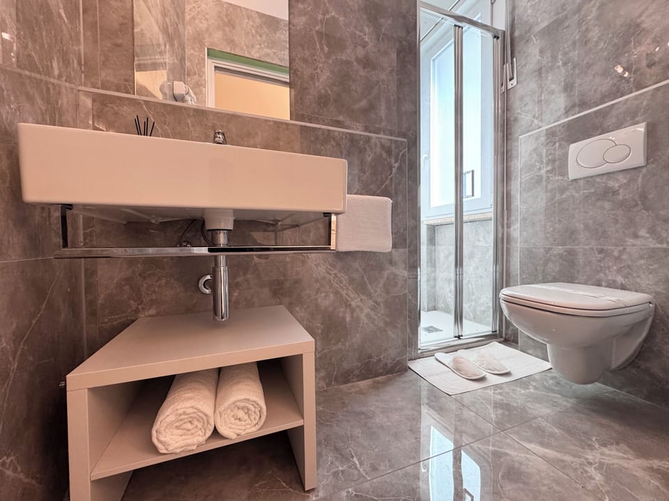 Economy Double Room, Private Bathroom | Bathroom | Shower, hair dryer, towels, soap