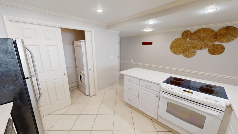 Condo, 2 Bedrooms | Private kitchen | Coffee/tea maker, fridge, oven, stovetop