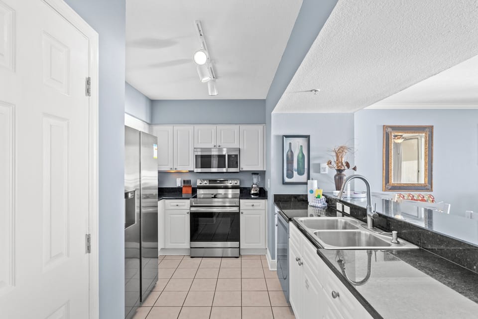 Condo, Multiple Beds, Balcony, Ocean View (Emerald Beach Resort 2028) | Private kitchen | Fridge, microwave, oven, stovetop