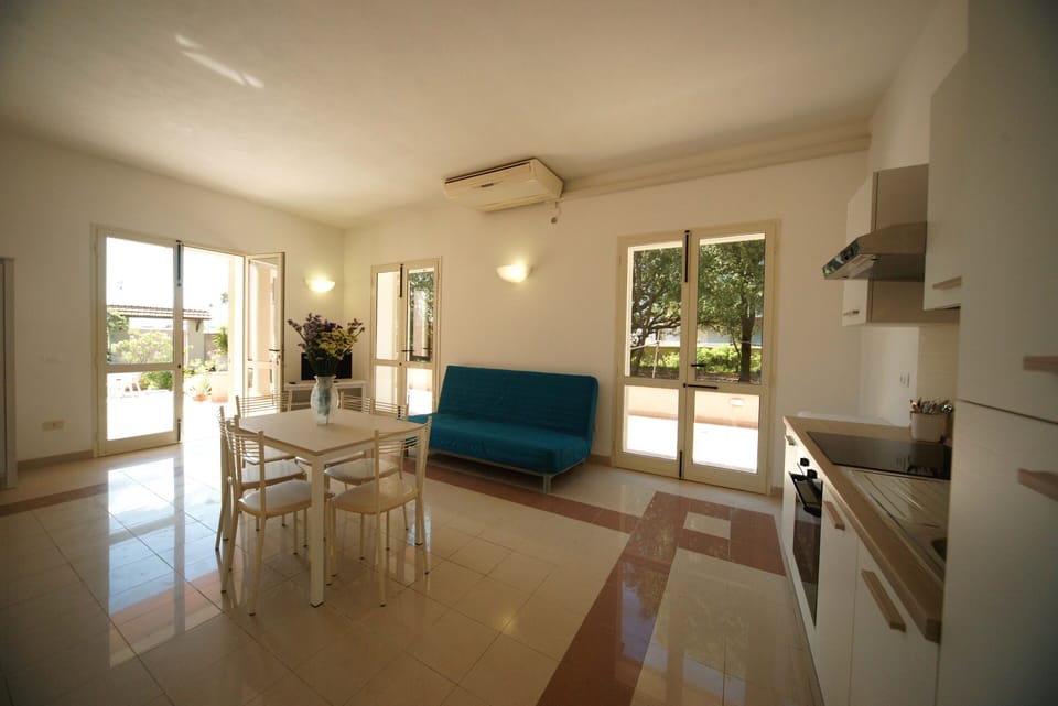 Studio, Patio | Down comforters, minibar, desk, iron/ironing board