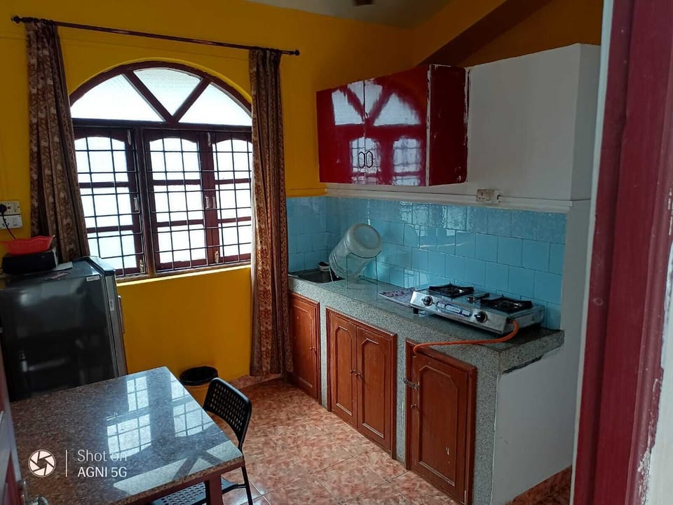 Comfort Apartment, Balcony, Garden View | Private kitchen | Full-size fridge, microwave, cookware/dishes/utensils