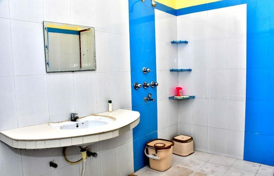 Shower, slippers, towels, soap