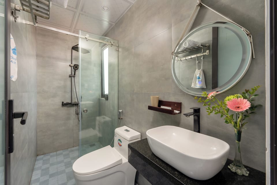 Shower, free toiletries, hair dryer, slippers