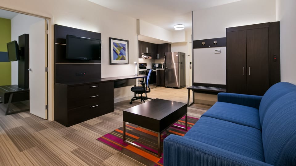 Suite, 1 Bedroom, Kitchen (Living) | Private kitchen | Fridge, microwave, coffee/tea maker, highchair