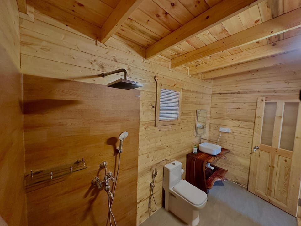 Deluxe Room, Balcony, Pool View | Bathroom | Shower, free toiletries, hair dryer, slippers