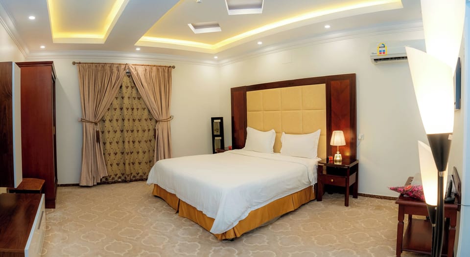 In-room safe, laptop workspace, blackout drapes, soundproofing