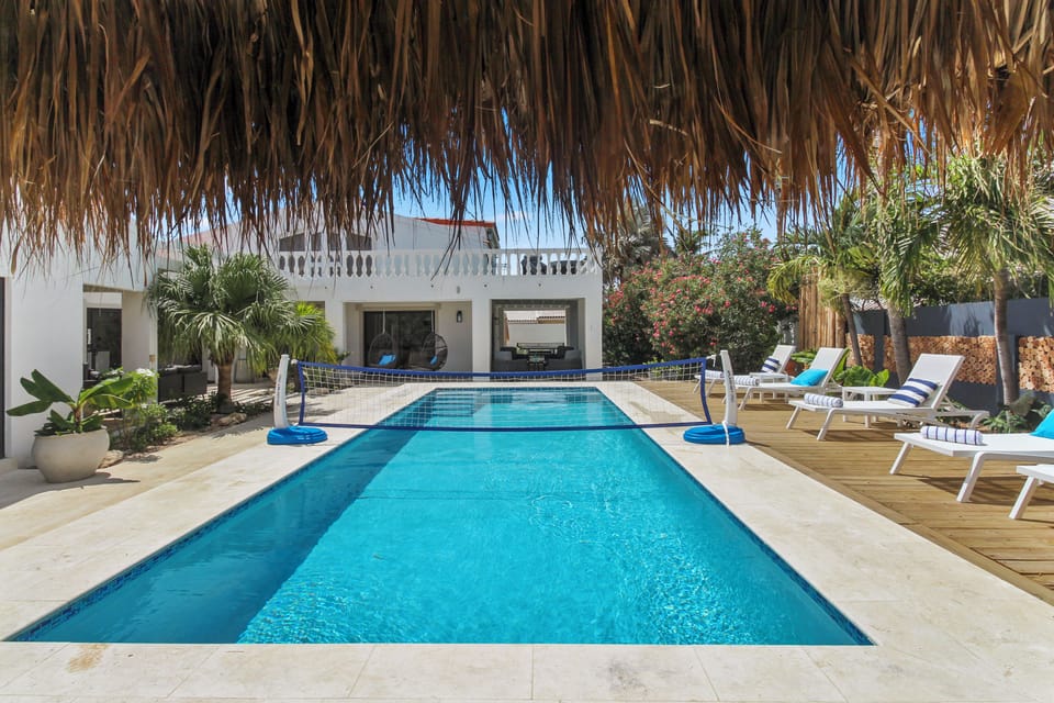 Outdoor pool, pool umbrellas, sun loungers