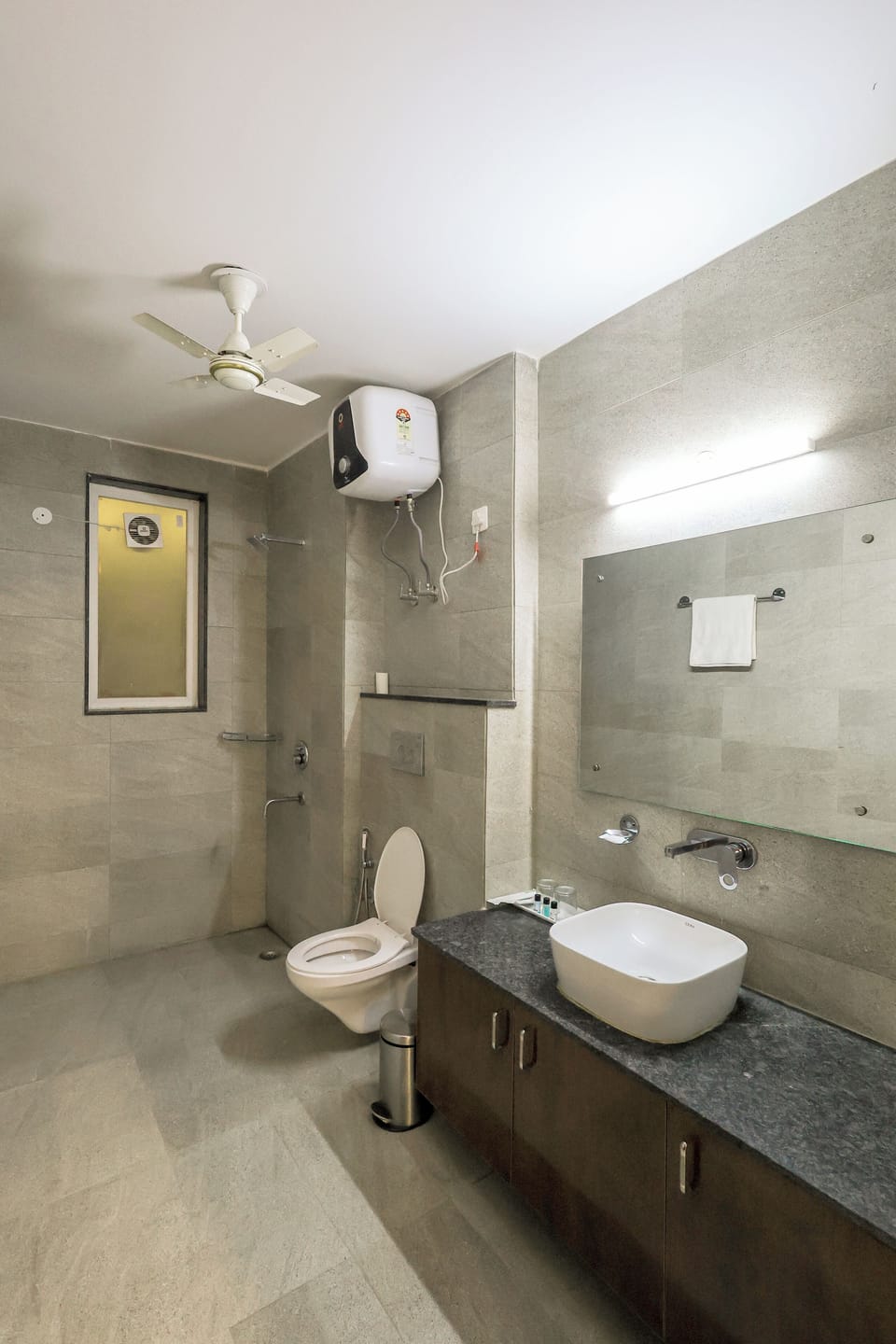 Shower, free toiletries, slippers, towels