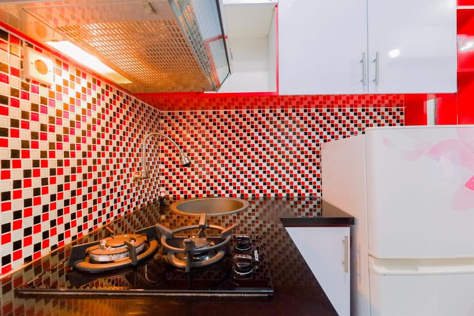 Apartment | Private kitchen | Full-size fridge, stovetop, rice cooker, dining tables