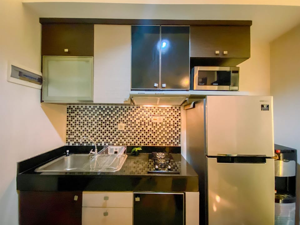 Apartment | Private kitchen | Full-size fridge, microwave, stovetop, electric kettle