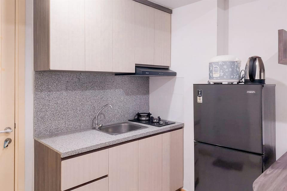 Apartment | Private kitchen | Full-size fridge, stovetop, rice cooker, dining tables