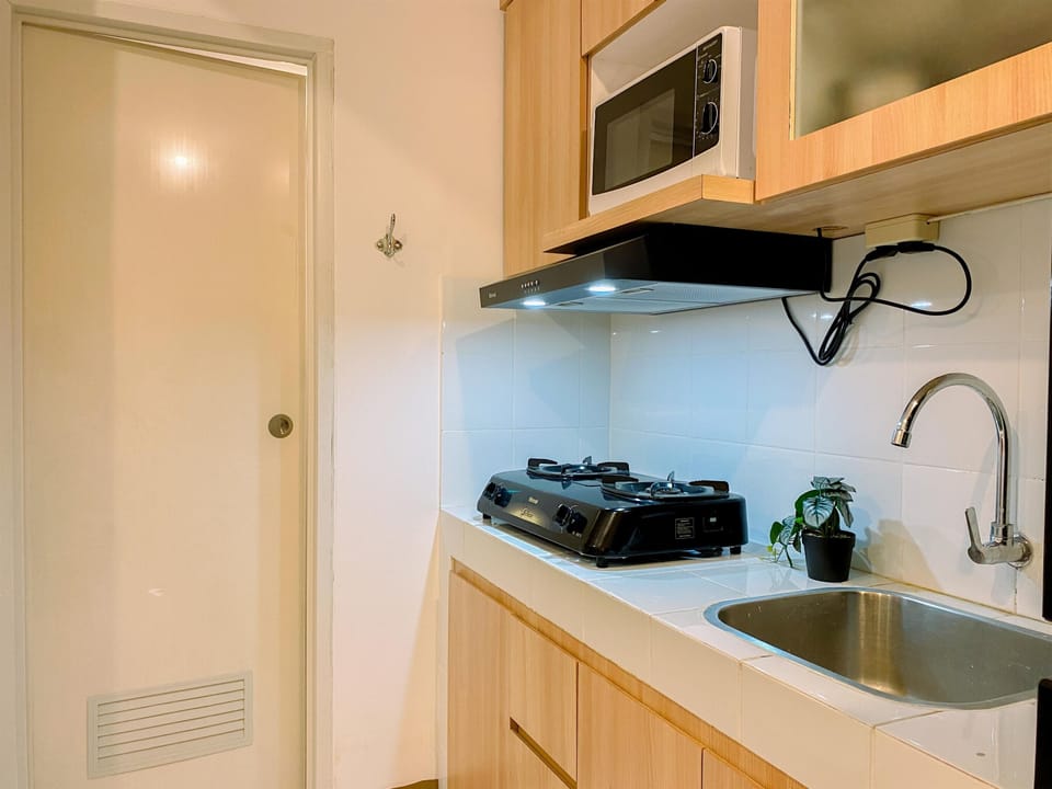 Apartment | Private kitchen | Full-size fridge, microwave, stovetop, rice cooker