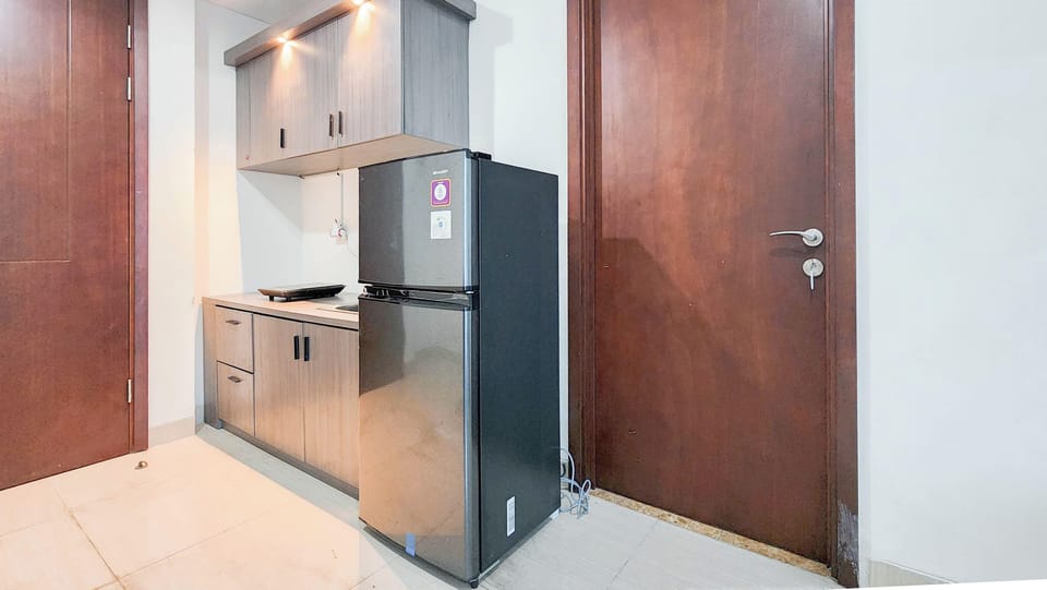Apartment | Private kitchen | Full-size fridge, stovetop, rice cooker, dining tables