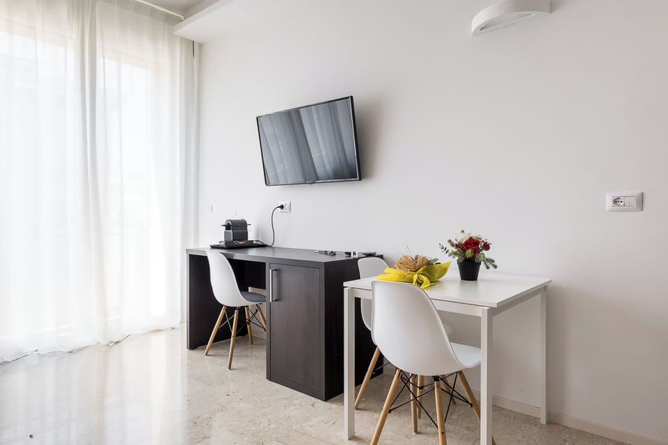 Apartment, Balcony | Living area | 35-inch TV with digital channels