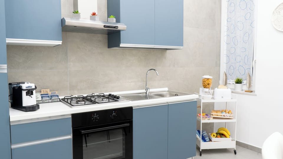Classic Quadruple Room | Private kitchen | Full-size fridge, oven, stovetop, espresso maker