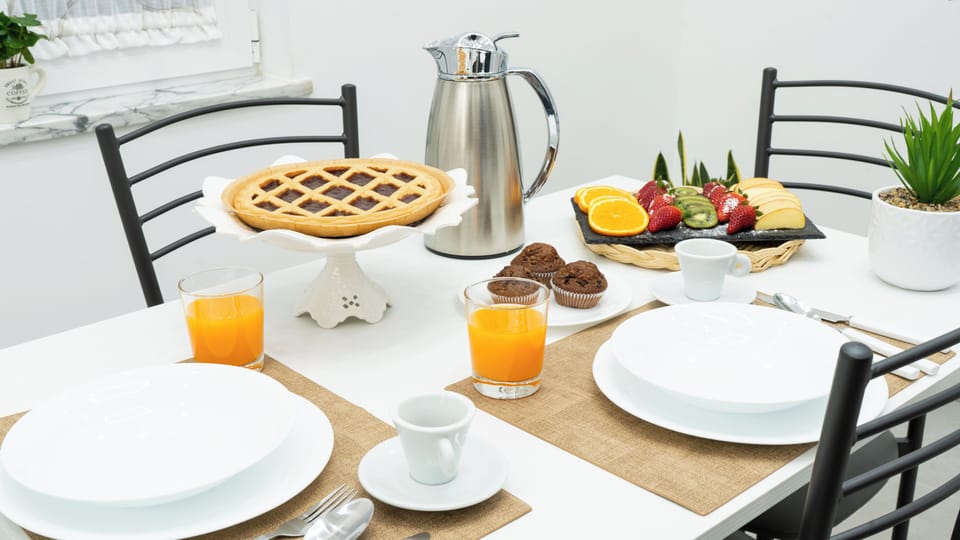 Family Room, Garden View | Private kitchen | Espresso maker, coffee/tea maker, full-size fridge, oven
