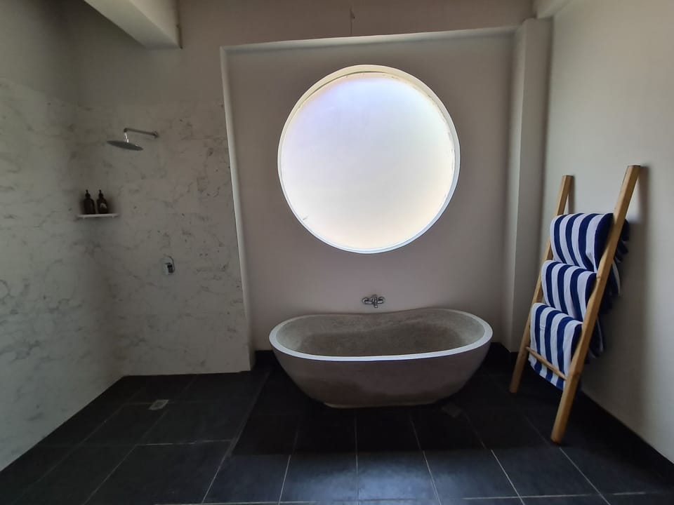 Family Villa, Pool View | Bathroom | Hair dryer, towels, soap, shampoo