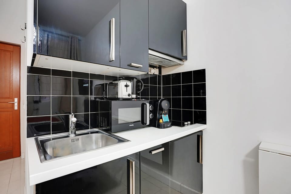 Apartment | Private kitchen | Cleaning supplies
