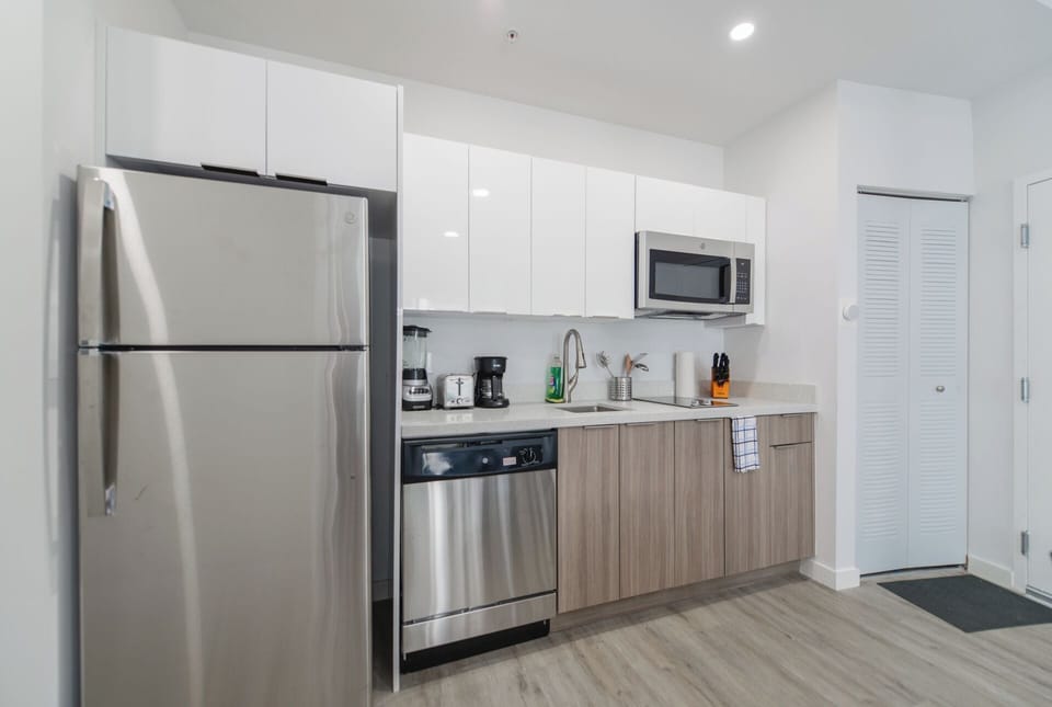 Apartment, Balcony, City View | Private kitchen | Coffee/tea maker, dining tables
