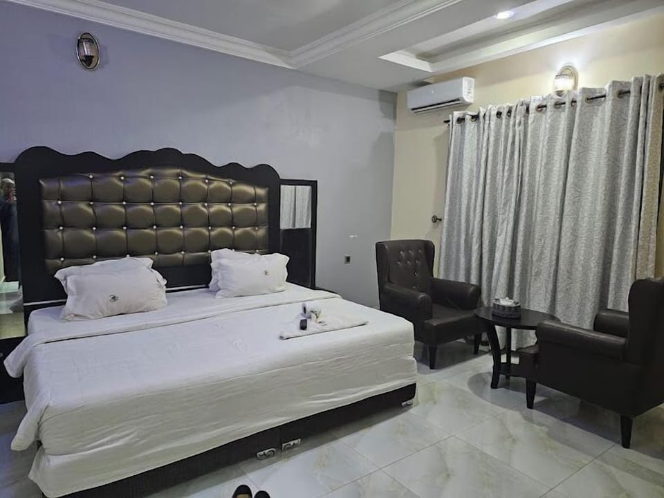 Deluxe Room, Balcony, City View | Desk, laptop workspace, free WiFi