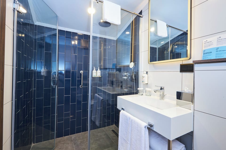 Shower, rainfall showerhead, hair dryer, slippers