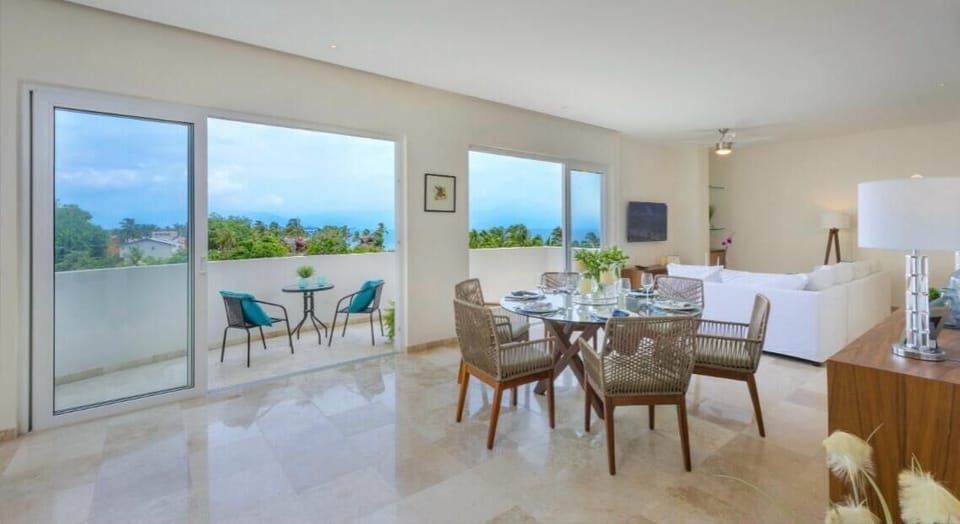 Apartment, Balcony, Partial Ocean View | Living area | 27-inch flat-screen TV with digital channels