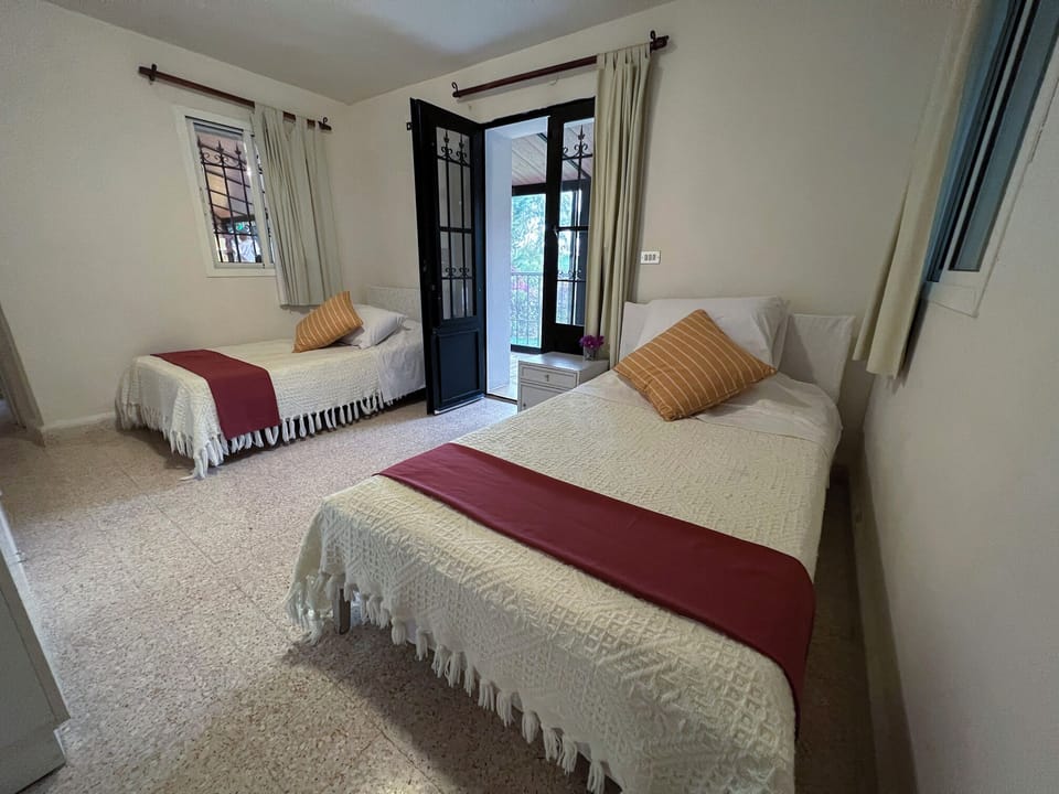 2 bedrooms, desk, laptop workspace, blackout drapes