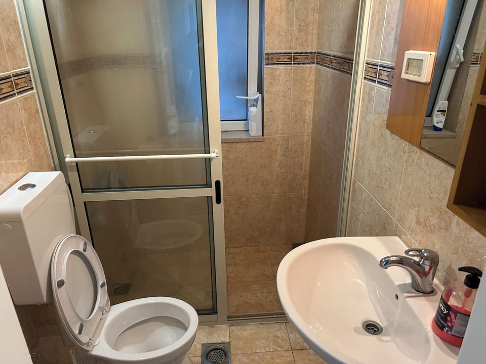 Standard Room, Multiple Beds, Garden View | Bathroom | Combined shower/tub, free toiletries, hair dryer (on request), soap