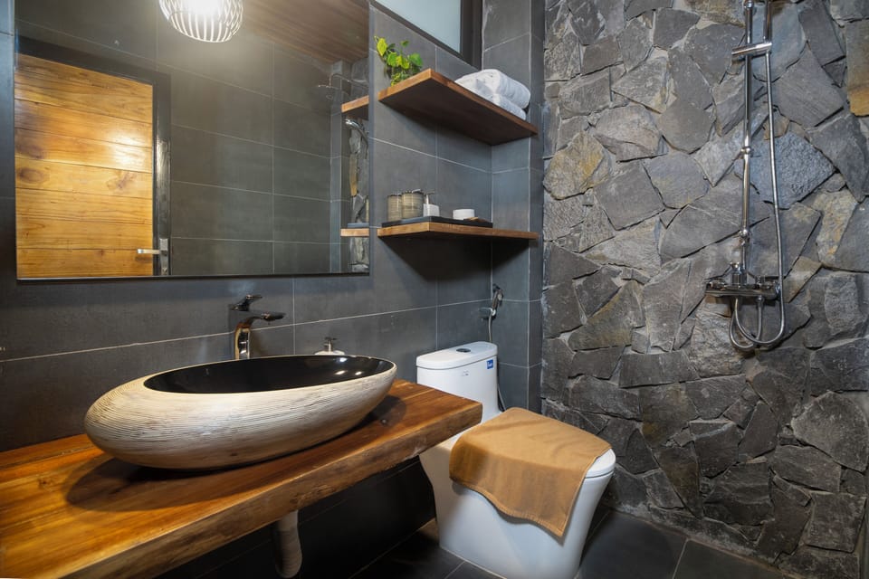 Deluxe Quadruple Room, Lake View | Bathroom | Shower, free toiletries, hair dryer, slippers