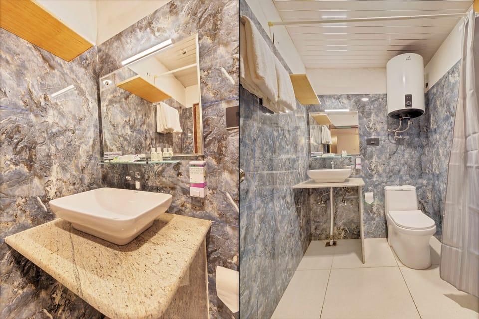 Standard Room | Bathroom | Shower, free toiletries, towels, soap