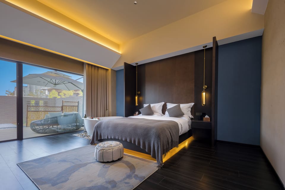 Luxury Double Room, Courtyard View | Minibar (free items), desk, laptop workspace, WiFi (free)